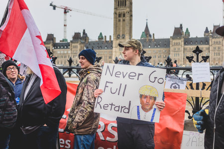 Ottawa, Ontario, Canada - February 11, 2022. Protester Message on Wellington Street Front or Parliament Hill During Freedom Convoy Protest in Ottawa.のeditorial素材