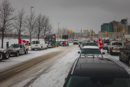 Ottawa, Ontario, Canada - February 12, 2022. Many Trucks and Cars Parked near a Camp for the Freedom Convoy Protest in Ottawa.のeditorial素材