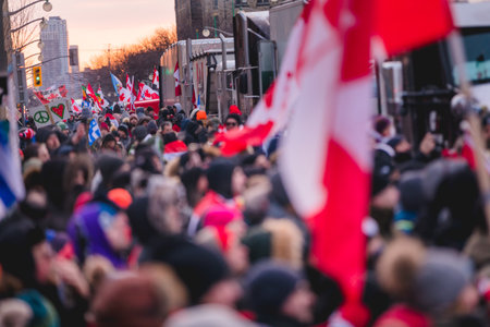 Ottawa, Ontario, Canada - February 12, 2022. Crowd of Protesters in Front of Parliament during Freedom Convoy Protest in Ottawa.のeditorial素材