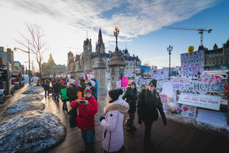 Ottawa, Ontario, Canada - February 13, 2022. Protester Messages on the Fence of the Parliament during Freedom Convoy Protest in Ottawa.のeditorial素材