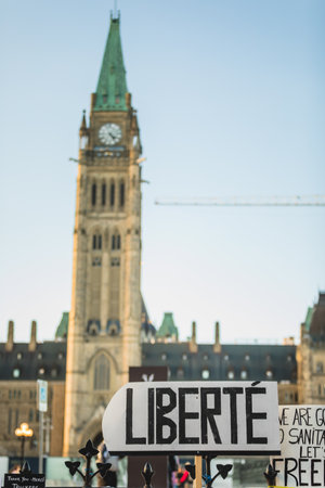Ottawa, Ontario, Canada - February 13, 2022. Protester Placard on the Fence of the Parliament during Freedom Convoy Protest in Ottawa.のeditorial素材