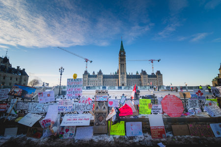 Ottawa, Ontario, Canada - February 13, 2022. Protester Messages on the Fence of the Parliament during Freedom Convoy Protest in Ottawa.のeditorial素材