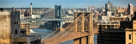 Morning mist on the East river under the Manhattan and Brooklyn Bridges in New York City USA