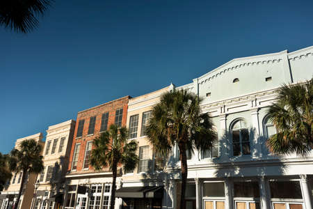 Row of old historic downtown business buildings on Broad and Meeting streets in Charleston South Carolina USAの写真素材