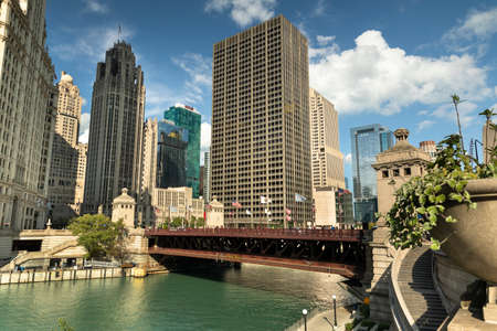 City buildings and skyline over the Chicago River Illinois USA