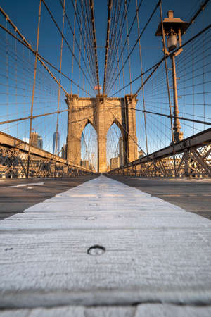 Pedestrian path over the Brooklyn Bridge connecting Manhattan New York City over the East Riverの写真素材