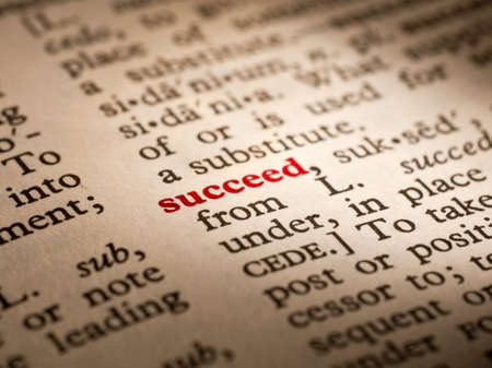 Succeed in the pages of an English dictionaryの写真素材