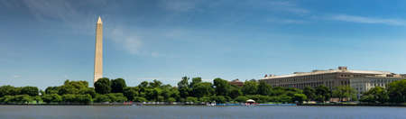 Washington DC Monument and the US Capitol Building across the Tidal Basin from the Jefferson Memorial on The National Mall USAの写真素材