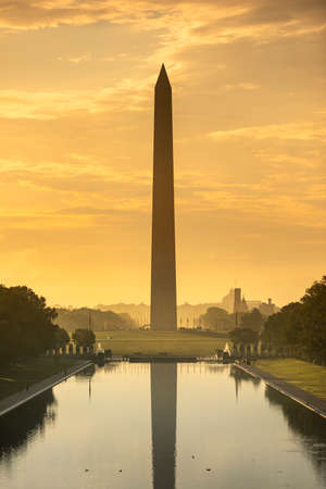 Washington DC Monument and the US Capitol Building across the reflecting pool from the Lincoln Memorial on The National Mall USAの写真素材