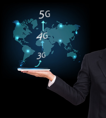 Businessman holding a tablet. Business communication on the network interface to internet and world...