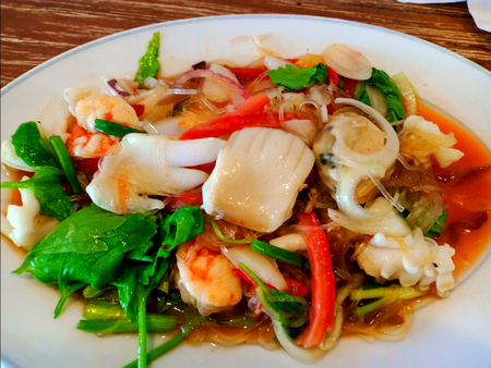 Spicy noodle salad with sea foodの写真素材