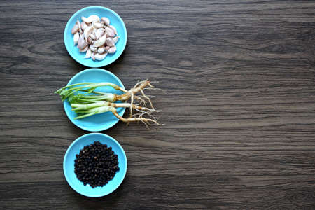 Garlic, coriander root, and pepper three-ingredient very important to make Thailand food.の写真素材