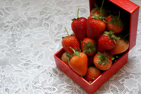 Fresh strawberry fruits in box set for  valentine day.の写真素材