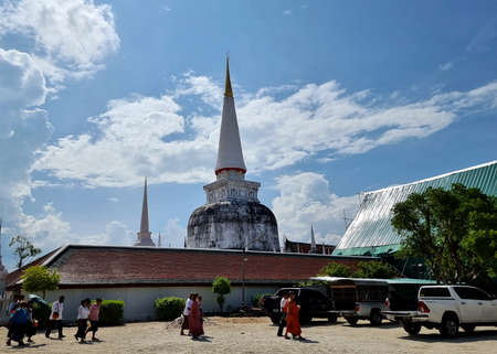 Nakhon Si Thammarat Province, Thailand - April 3, 2021: People come to joy Thai Buddhist monk ordination Wat Phra Mahathat Woramahawihan is the main Buddhist temple.のeditorial素材