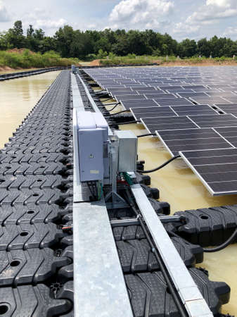 Floating Photovoltaic Solar Plants: Walkway and Inverter installation of Floating Solar PV System.