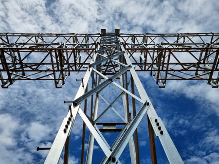 Construction of Substation: Steel structure of high voltage take-off tower on the blue sky backgroundの写真素材