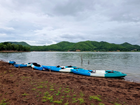 The Kayaks parked along the reservoir, relaxing on a holidayの写真素材
