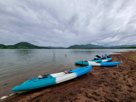 The Kayaks parked along the reservoir, relaxing on a holidayの写真素材