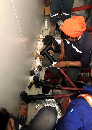 The perspective of MV power cable termination installation by cable connector worker for medium...
