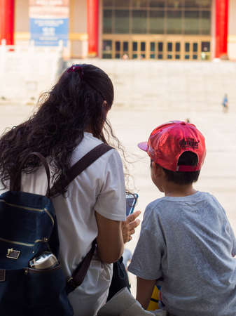 Asian toddler and his motherの写真素材