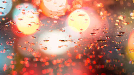 Bokeh from traffic lights in the rainの写真素材