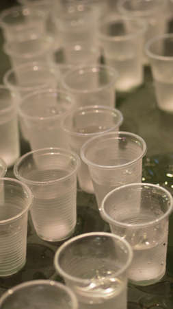 Plastic cups with waterの写真素材