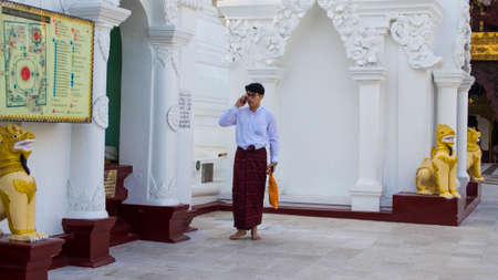 Yangon, Myanmar - February, 15, 2018: Buddhists at Shwedagon Pagodaのeditorial素材