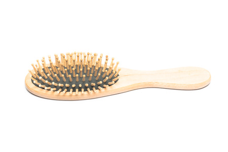 hairbrush made from wood isolated on a white backgroundの写真素材