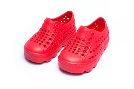 Resin shoes for baby isolated on white backgroundの写真素材