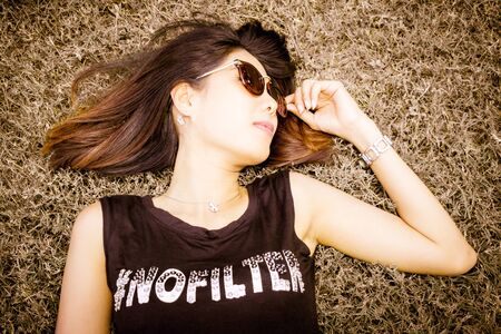 Beautiful Model girl on the Field, vintage fashionの写真素材