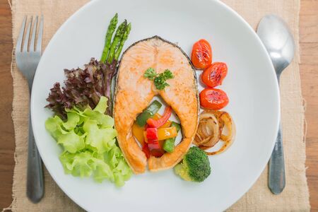 Salmon steak grilled with vegetableの写真素材