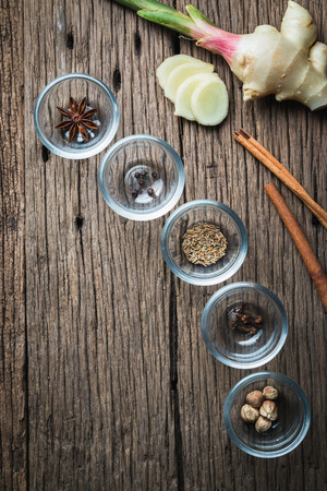 masala chai with spices. Cinnamon Stick, Thai Cardamom, Ginger, Clove, Star Anise, Black Peppercorns, Fennel Seeds, Black Teaの写真素材