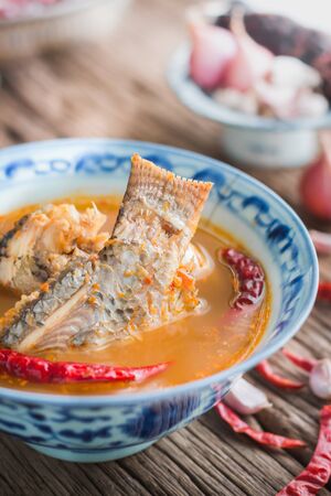 sour soup made of tamarind paste with tilapia or "Kaeng Som" traditional thai foodの写真素材