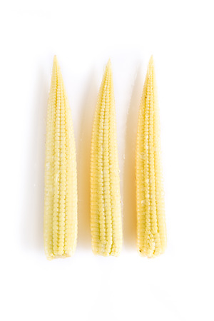 close-up fresh Baby corn on white backgroundの写真素材