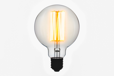 vintage electric lamp, light bulb isolate on white background.の写真素材