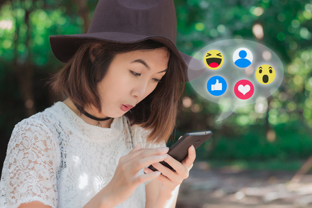 Oct 30, 2016 beautiful girl surprise with a smartphone, Social Network, Social media Concept.のeditorial素材
