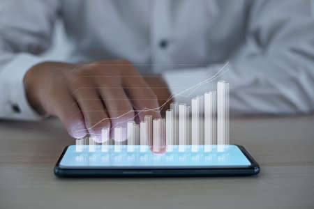 Business people analyze financial charts growth and success increase in business profits with smart...