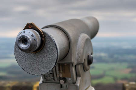 Viewing telescope looking out from a viewing pointの写真素材