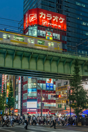 Rush hour commuters cross the road in Akihabara, Tokyoのeditorial素材