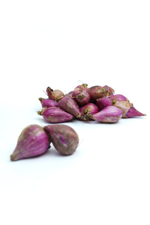 Shallot on white background. Shallow depth of field.の写真素材