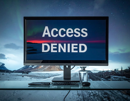 A computer monitor shows an access denied screen against a scenic landscape backdrop This image conveys digital security concerns and is ideal for cybersecurity illustrations.の素材