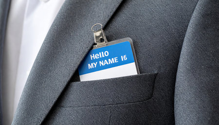 Close up of a ID card in the pocket of a suit.の素材