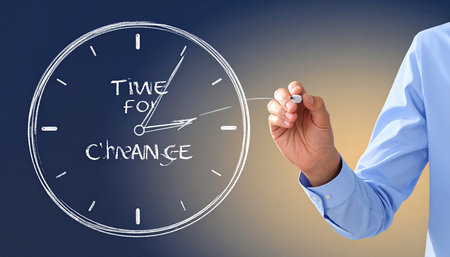 Businessman drawing time for change concept with black marker on transparent screen.の素材