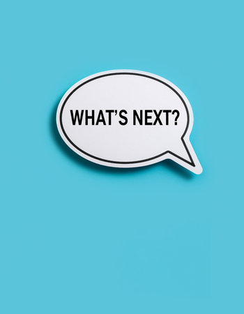 White speech bubble with text Whats Next on a bright blue background Clear details and vibrant colors enhance...の素材