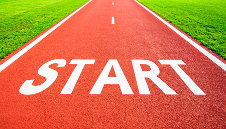 Start text on running track in stadium. Sport and competition concept.の素材