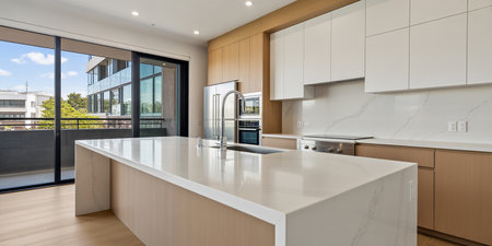 Interior of a new house, domestic kitchen with white and wooden wallsの素材