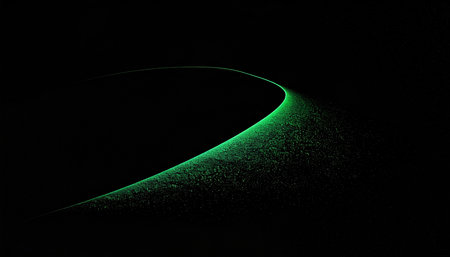 Green light effect on a black background. Abstract background for design.の素材