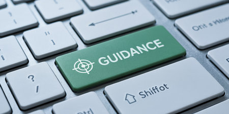 A close-up of a green keyboard key labeled GUIDANCE with a target icon. Clear details and vibrant colors enha...の素材