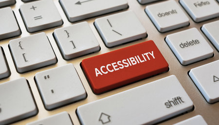 A close-up view of a computer keyboard with a red "ACCESSIBILITY" button Clear details and vibrant colors enh...の素材