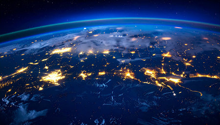 South America from space on planet Earth at night with visible city lights. 3D illustration.の素材
